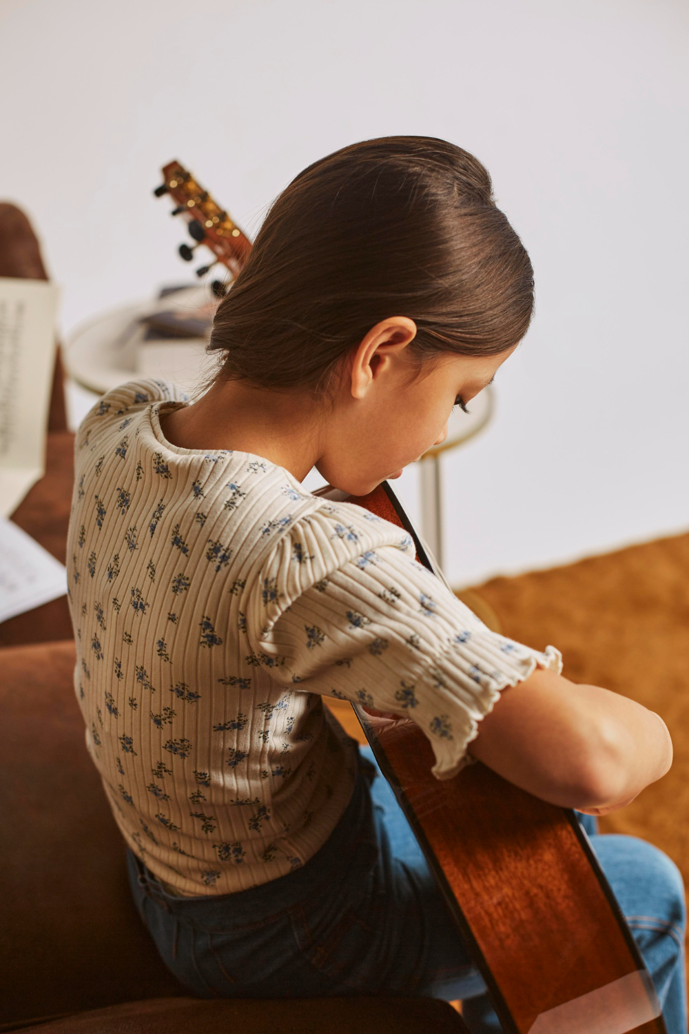 girl playing guitar