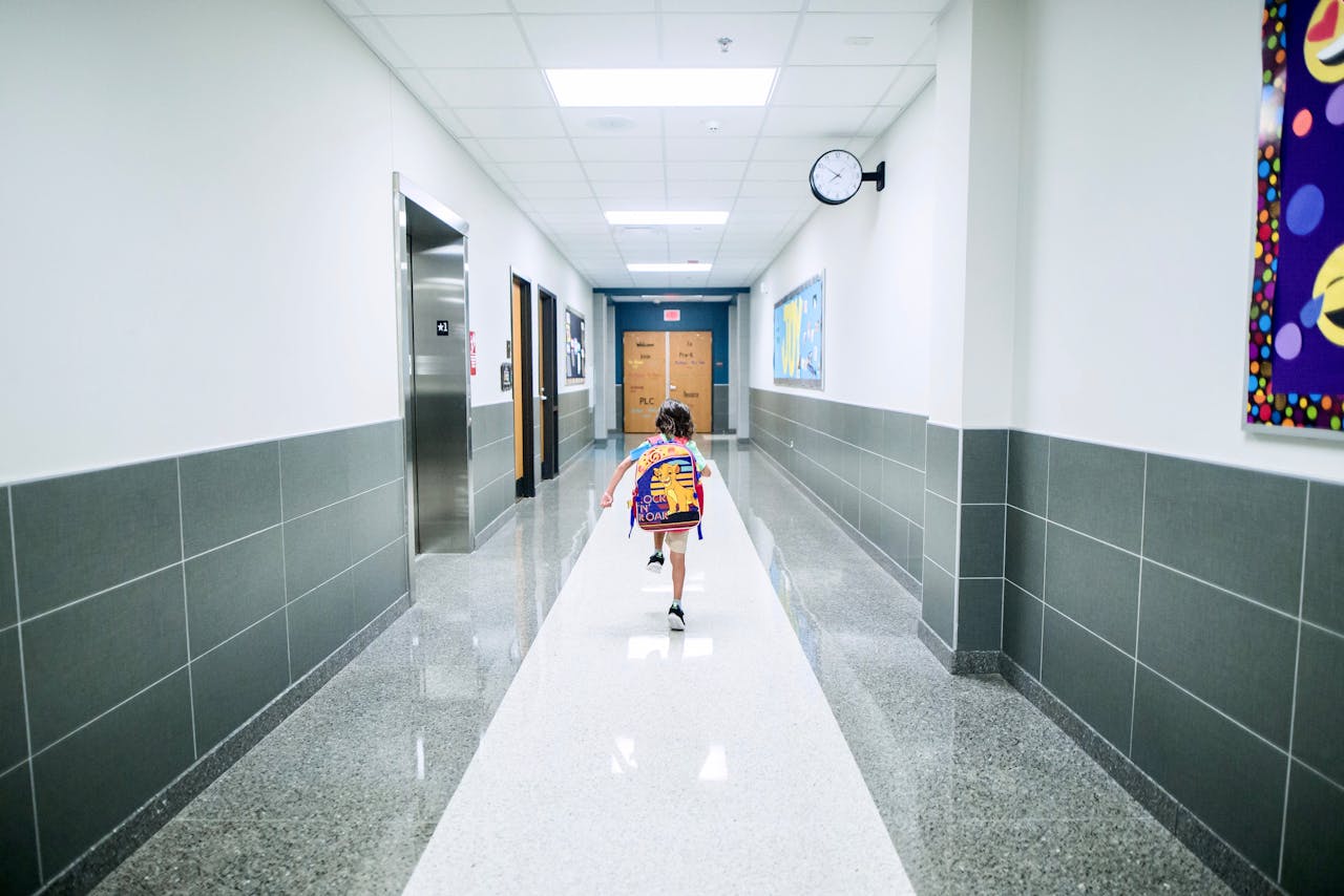 boy running in hallway